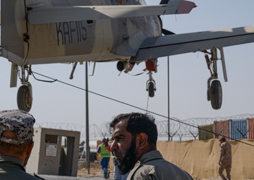 Multi-national forces transport Kuwait aircraft