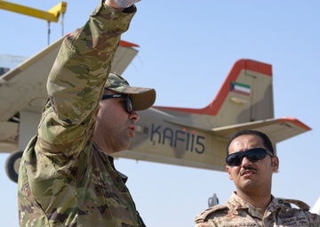 Multi-national forces transport Kuwait aircraft