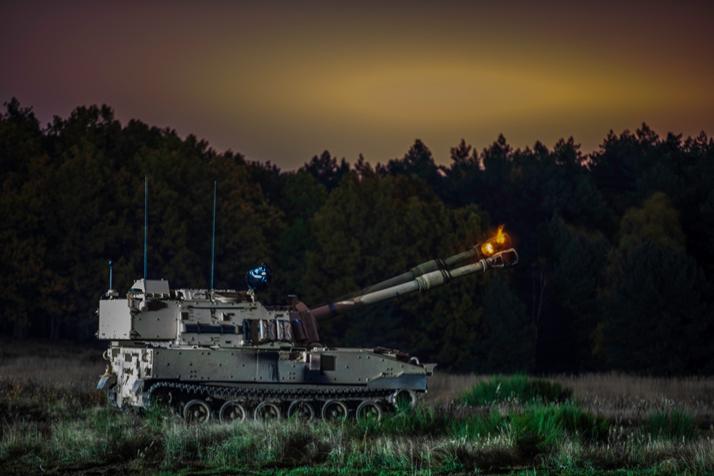 Victory Eagle conducts a combined arms artillery night live-fire at DPTA