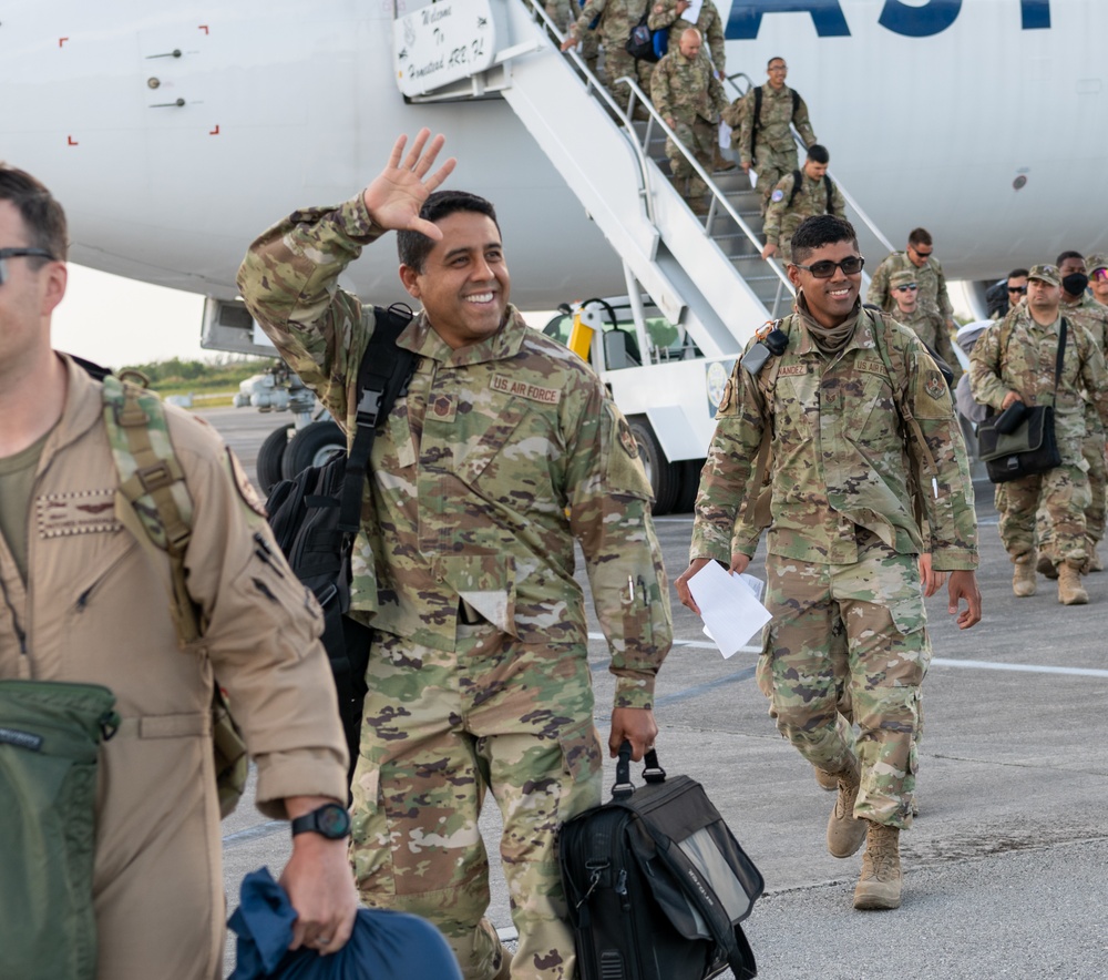 Master Sgt Feliciano waves hello to his family