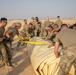332nd AEW Airmen layout collapsible fabric tank
