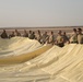 332nd AEW Airmen layout collapsible fabric tank