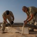 332nd AEW Airmen layout collapsible fabric tank