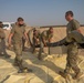332nd AEW Airmen layout collapsible fabric tank
