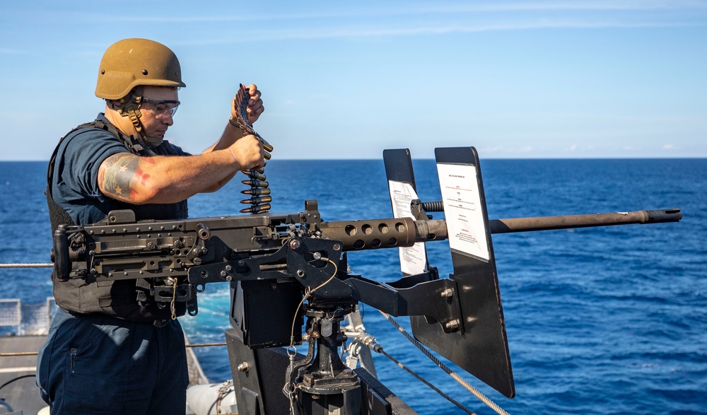 USS Billings Sailor Reloads a .50-Caliber Machine Gun During Live-Fire Ex