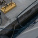 USS Jackson (LCS 6) Sailors Disconnect Potable Water Service