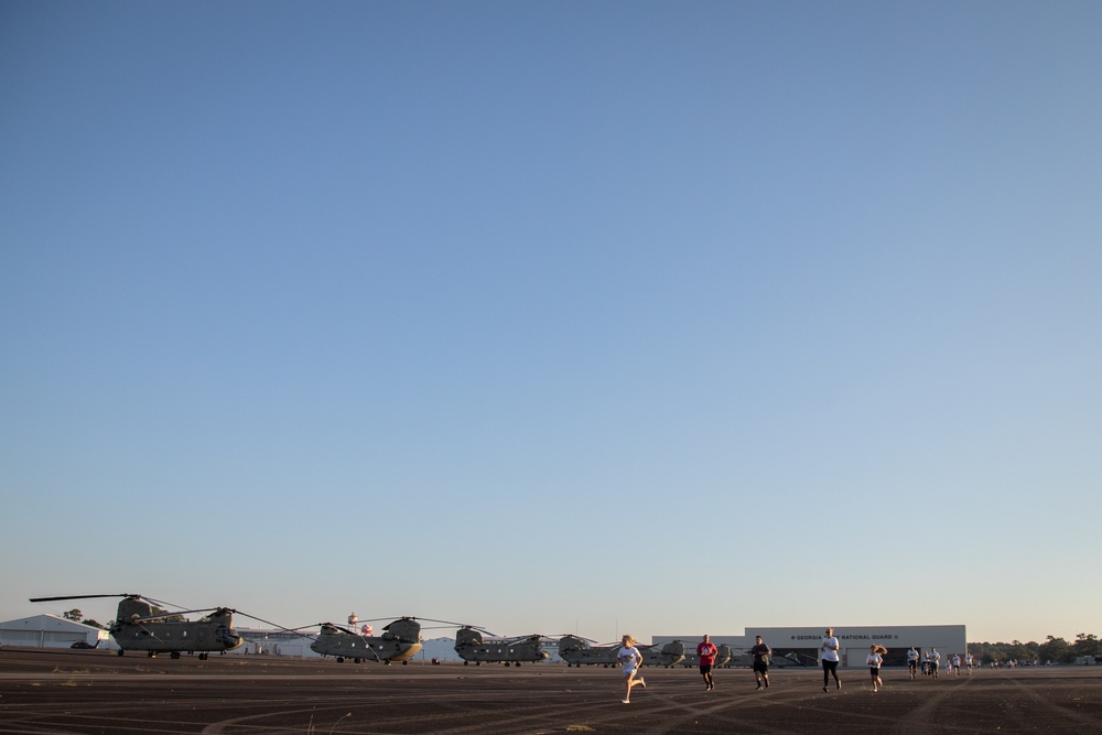 3rd Combat Aviation Brigade Soldiers and Families run in the Brawler 5k Color Run.