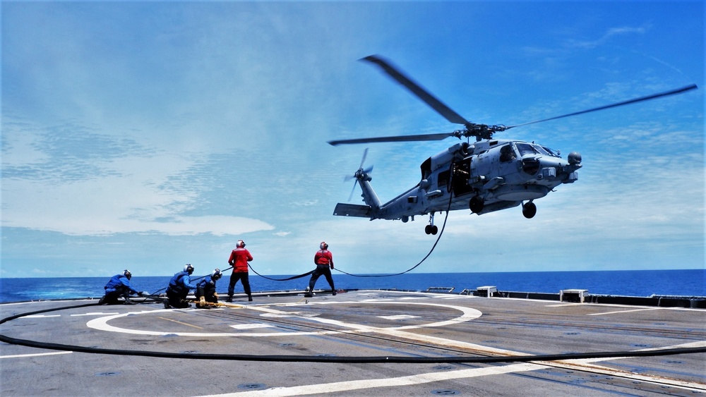 USS Lake Champlain (CG 57) Conducts Vertical Replenishment