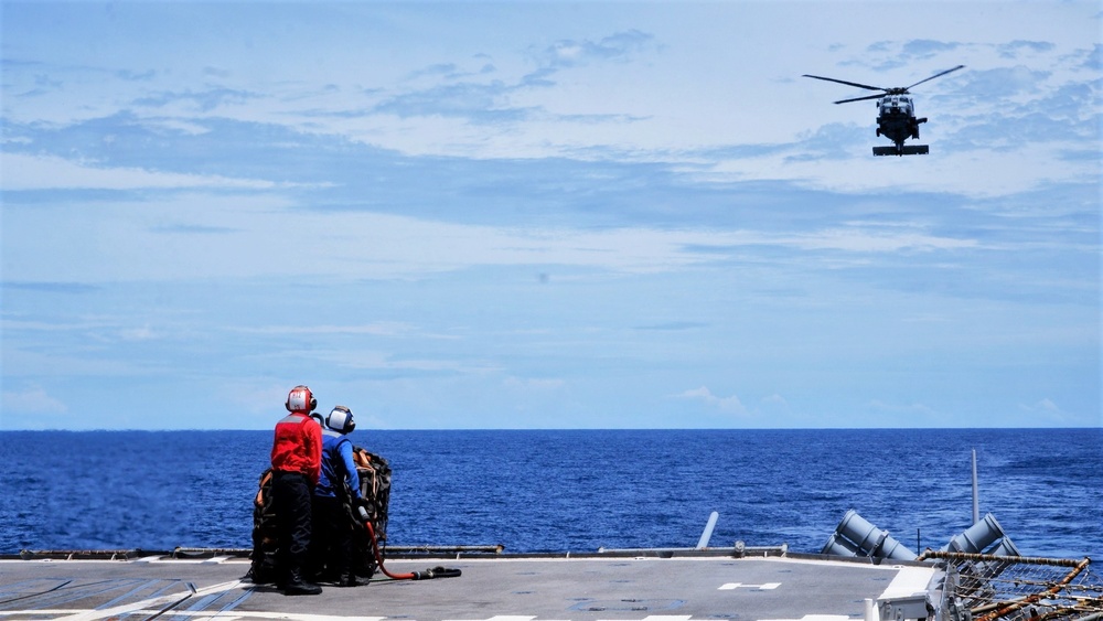 USS Lake Champlain (CG 57) Conducts Vertical Replenishment