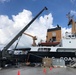 NMCB 1 Provides Crane Support to MPSRON 3 in Guam