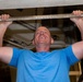 YN1 Jacob Miller Performs Pull-ups during a Physical Training Session