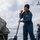 GMSN Raquell Carson Sweeps the Aft Missile-deck during a Fresh Water Wash-down aboard USS Dewey