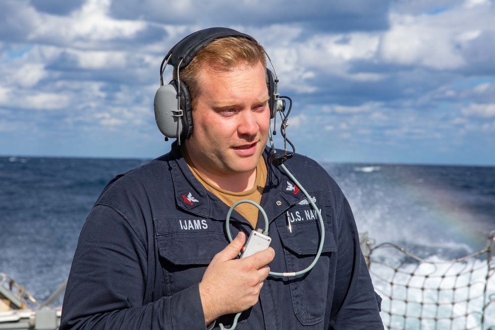 HT2 Ryan Ijams Stands Aft Lookout Watch aboard USS Dewey