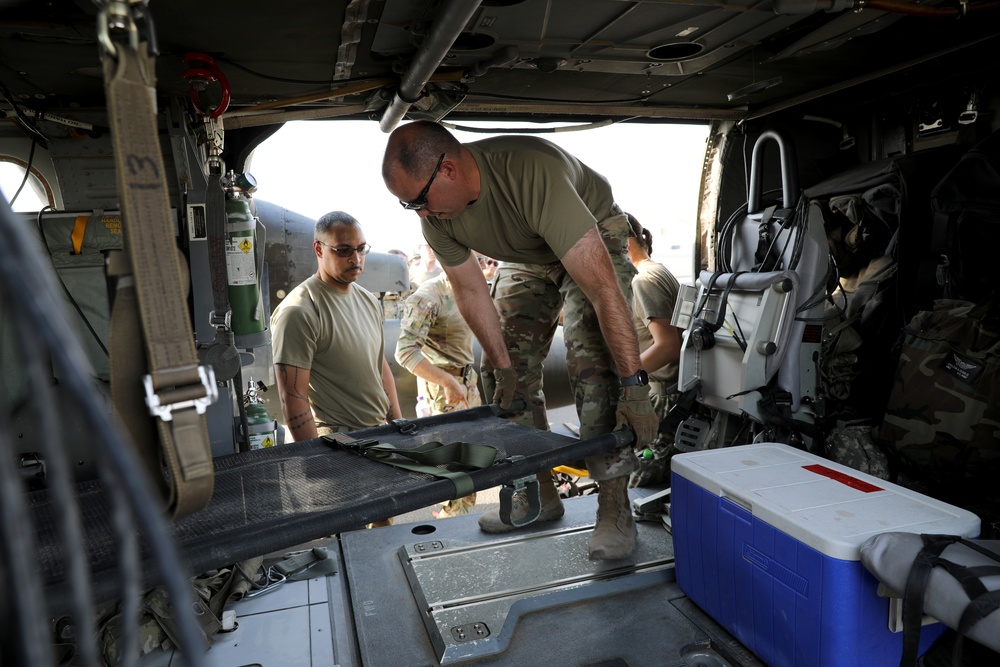 Task Force Raptor medics conduct hot/cold load training to Airmen at Camp Ali Al Salem