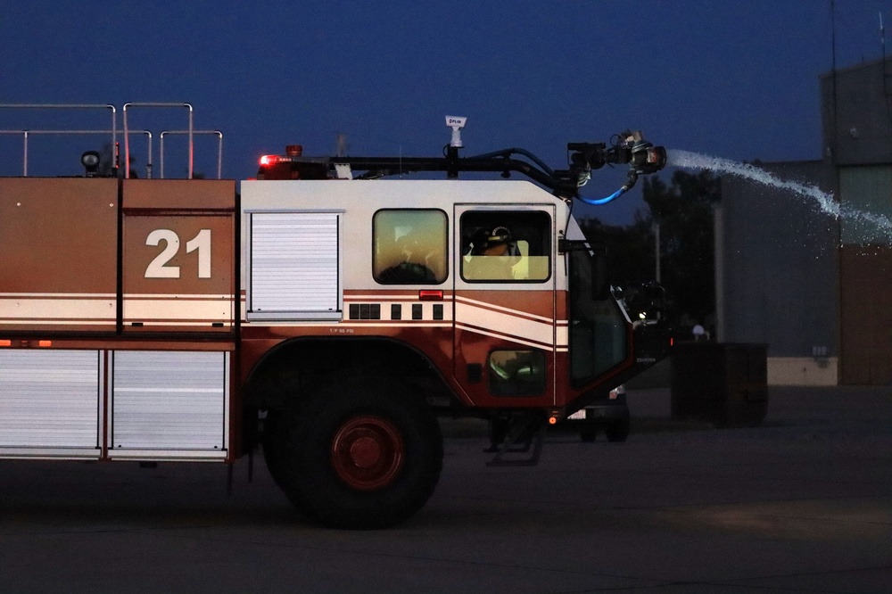 Fort Sill firefighters come out of the station ready to fight fire