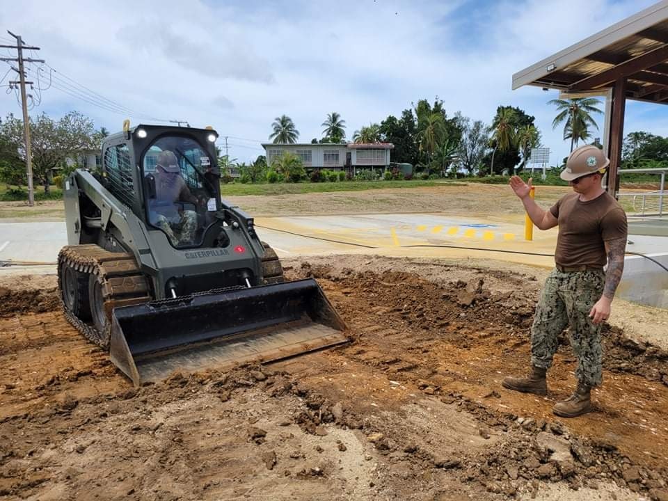 US Navy Seabees assigned to NMCB-5 support the PNG Defence Force