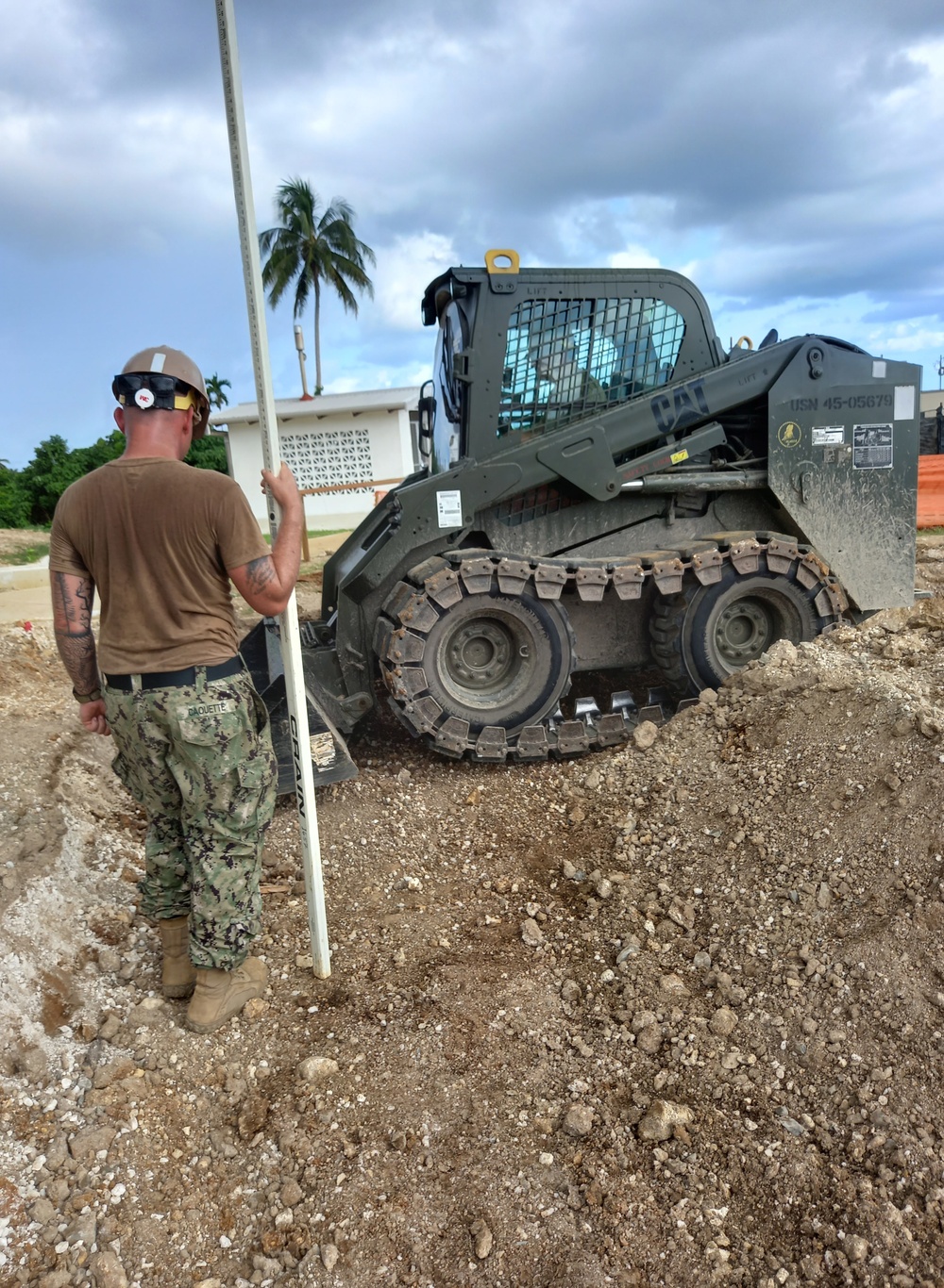 US Navy Seabees assigned to NMCB-5 support the PNG Defence Force