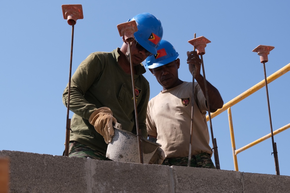 US Navy Seabees with NMCB-5 build a schoolhouse