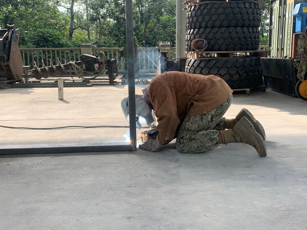 US Navy Seabees with NMCB-5 support Commander Fleet Activities Chinhae, South Korea