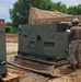 US Navy Seabees with NMCB-5 work with Marines from 7th ESB at Tinian, Northern Mariana Islands
