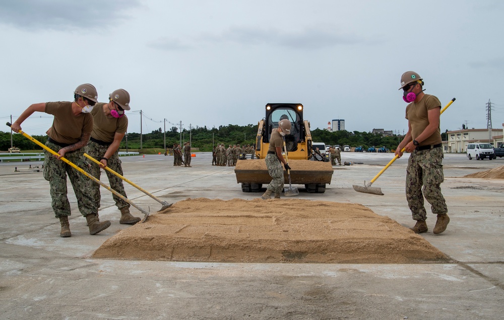 US Navy Seabees with NMCB-5 participate in joint airfield damage repair training