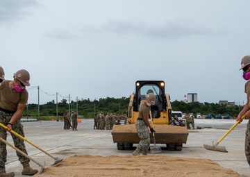US Navy Seabees with NMCB-5 participate in joint airfield damage repair training