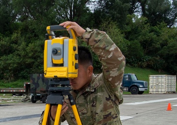 US Navy Seabees with NMCB-5 participate in joint airfield damage repair training