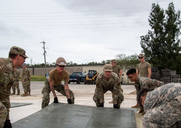 US Navy Seabees with NMCB-5 participate in joint airfield damage repair training