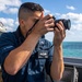 OS2 Jason Kostem Conducts Photography Collection aboard USS Dewey