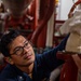 EM2 Ace Tapit Conducts Prevenative Maintenance in the Engine Room aboard USS Dewey