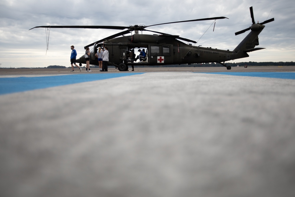 Soldiers from the 3rd Combat Aviation Brigade participate in the St. Andrew’s Career Exploration Day.