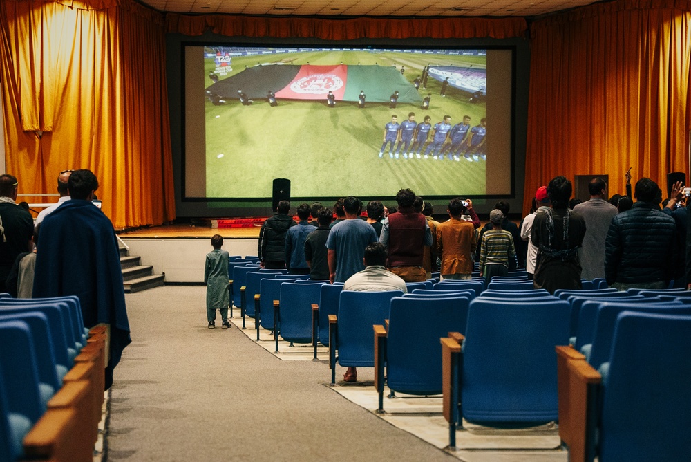 Afghan individuals watch the Cricket World Cup on Fort Pickett