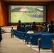 Afghan individuals watch the Cricket World Cup on Fort Pickett