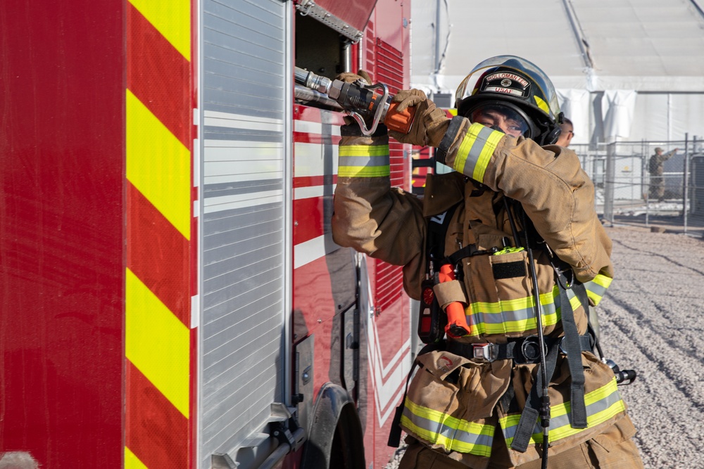 Task Force Holloman Fire Department and 49th Fire Department participate in a training activity at Aman Omid Village