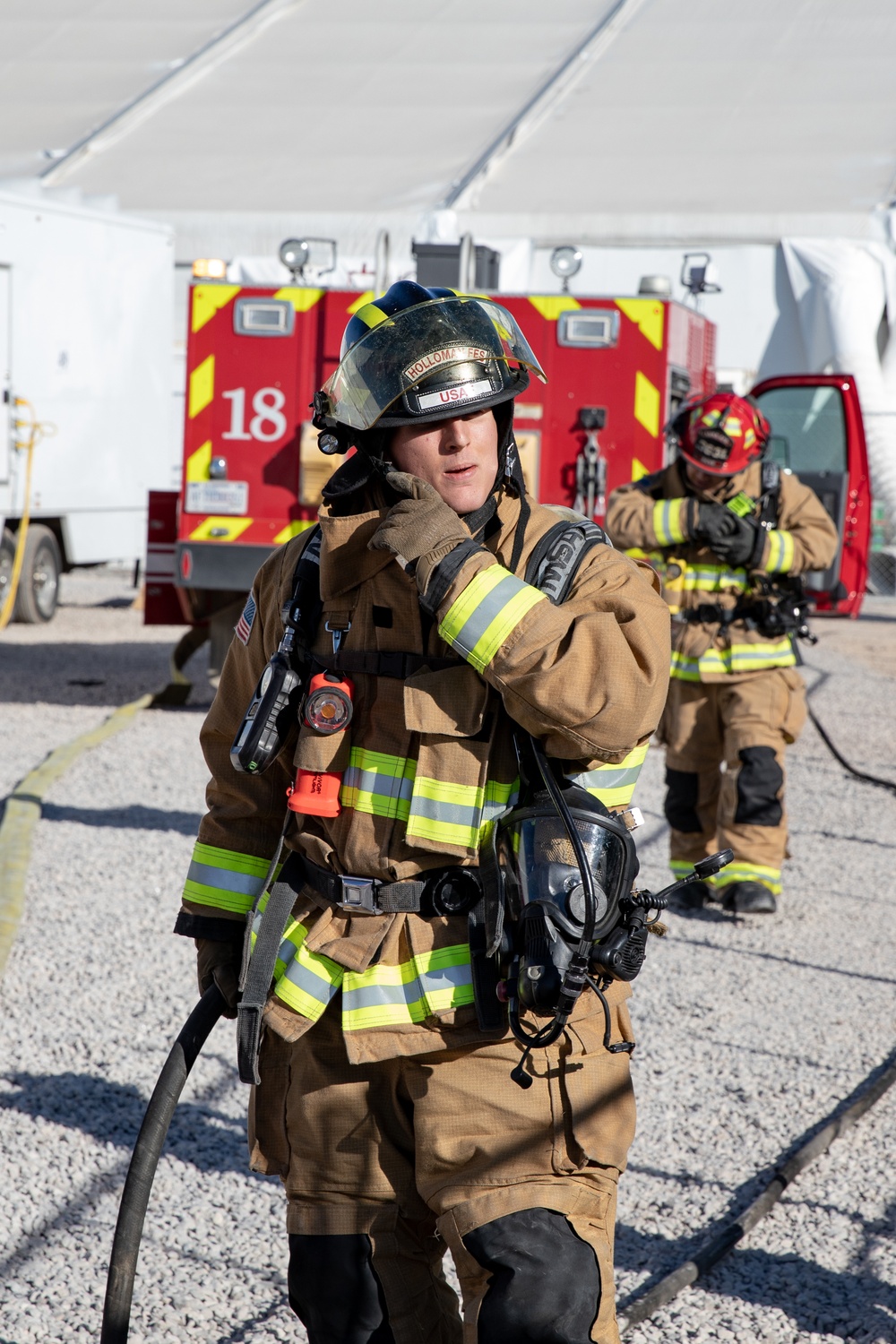 Task Force Holloman Fire Department and 49th Fire Department participate in a training activity at Aman Omid Village