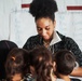 Task Force Pickett personnel read books to Afghan children