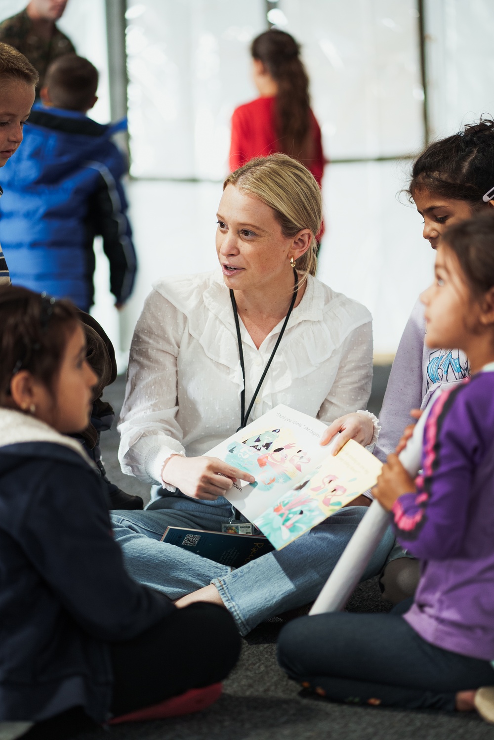 Task Force Pickett personnel read books to Afghan children