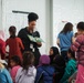 Task Force Pickett personnel read books to Afghan children