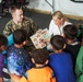 Task Force Pickett personnel read books to Afghan children