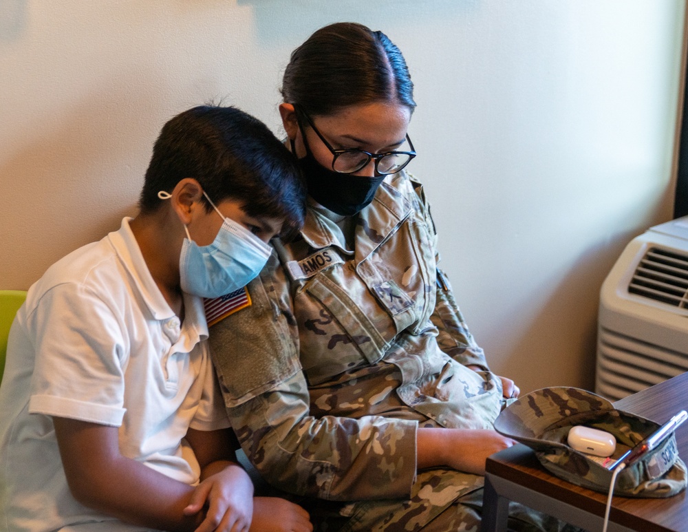 Task Force Eagle Personnel Interact with Afghan Guests