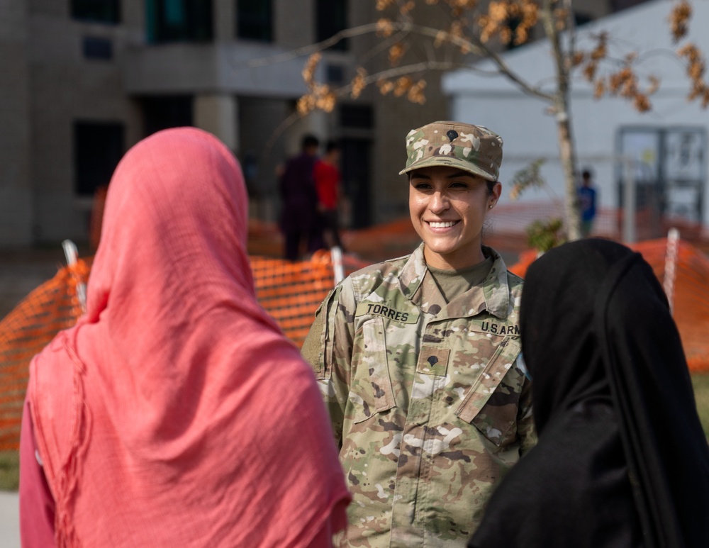 Task Force Eagle Personnel Interact with Afghan Guests