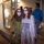 Volunteer guides pose in front of haunted house
