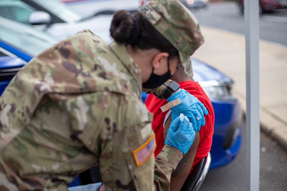 MDNG members of Maryland’s Vaccine Equity Task Force give COVID-19 vaccines in Takoma Park