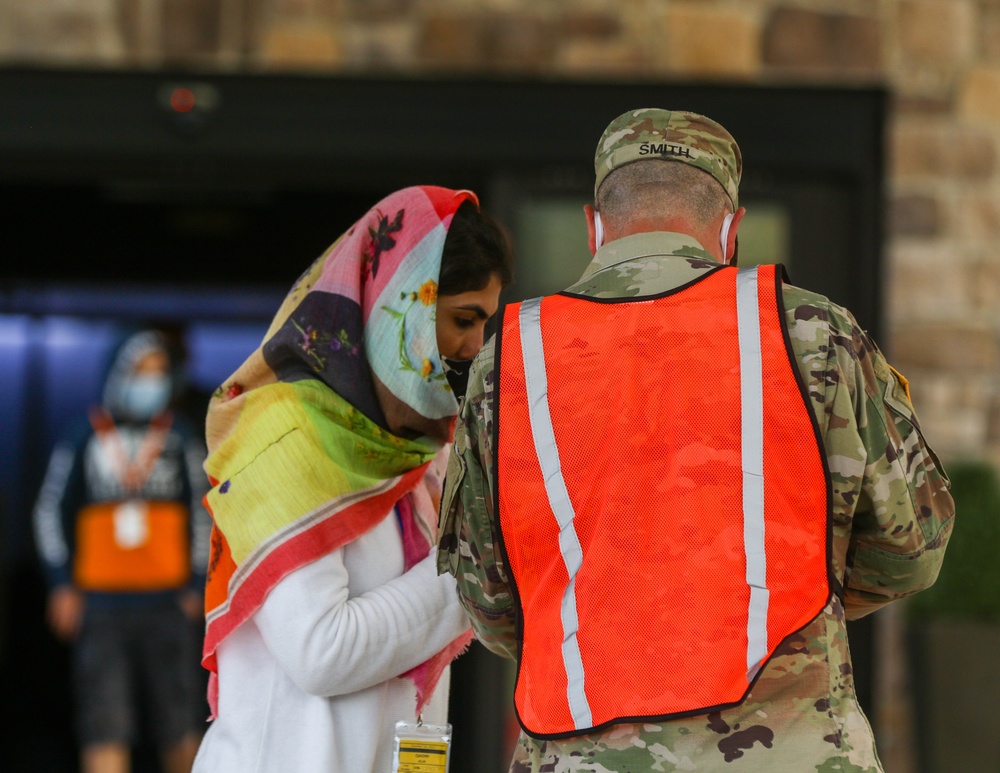 Task Force Eagle Personnel Interact with Afghan Guests