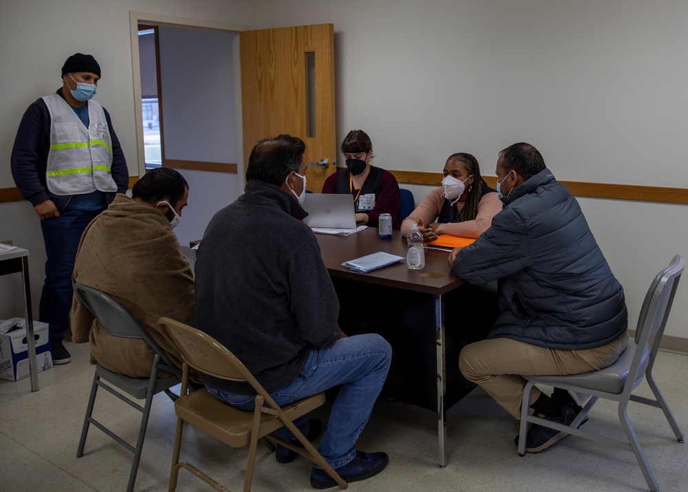 Guest Services Provide Information For Afghan evacuees