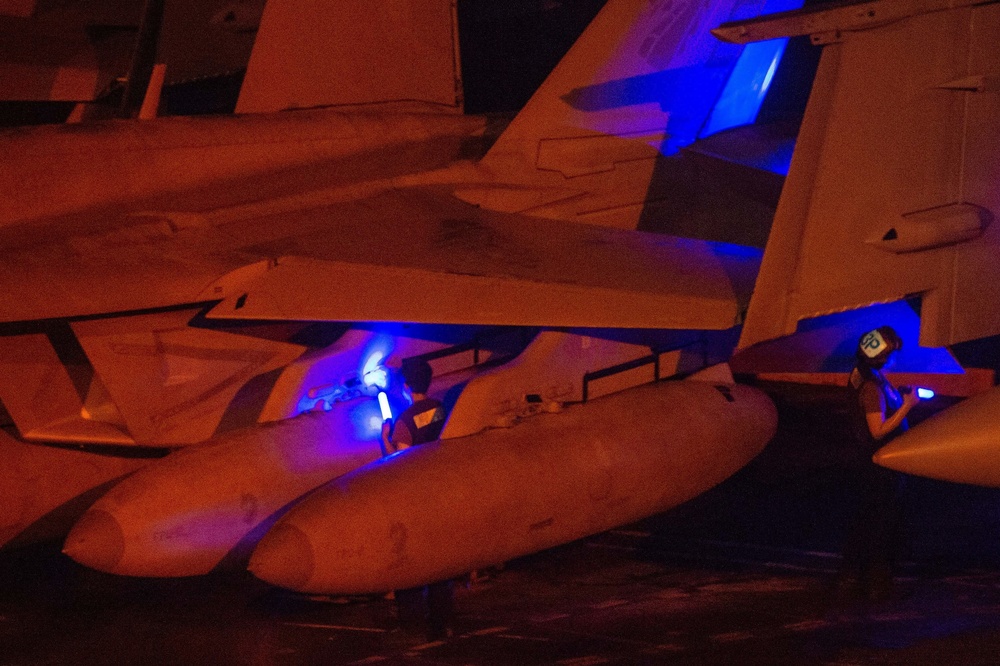 USS Carl Vinson (CVN 70) Sailors Conduct Night-Time Flight Deck Operations