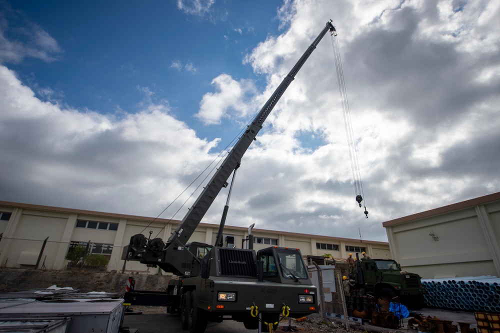 US Navy Seabees with NMCB-5 replace HVAC unit onboard Kadena Air Base