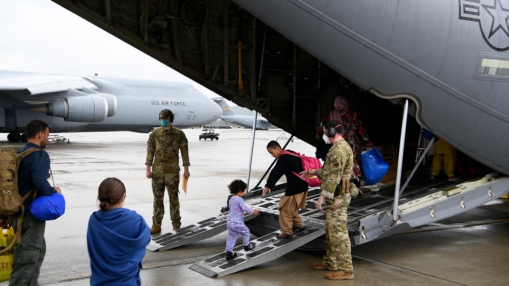Afghan evacuees head to their new home during OAR