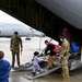 Afghan evacuees head to their new home during OAR