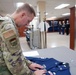 AFMAO prepares uniforms for the fallen